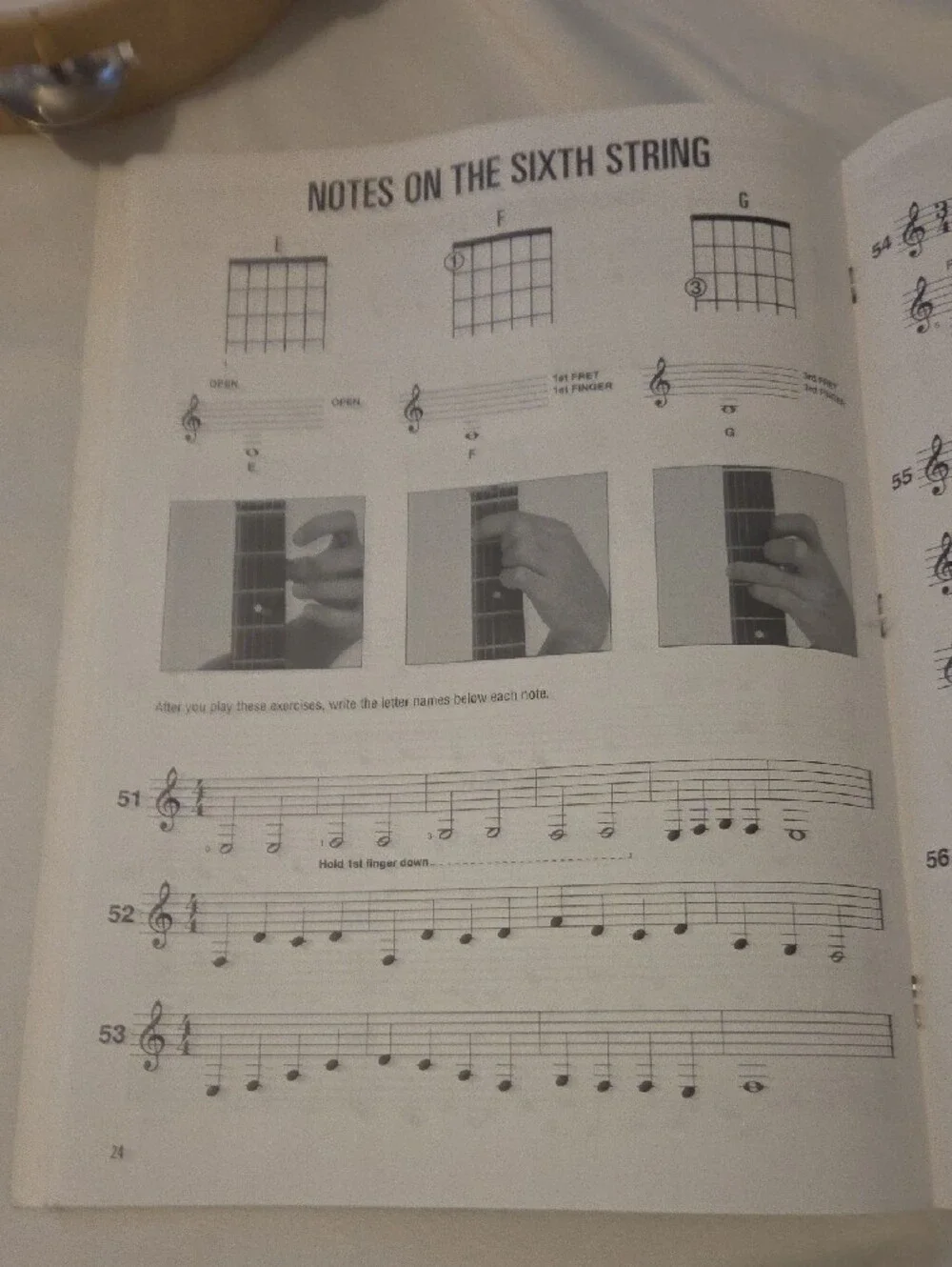 Fender Guitar Book & Beige Tambourine with Metal Jingles
